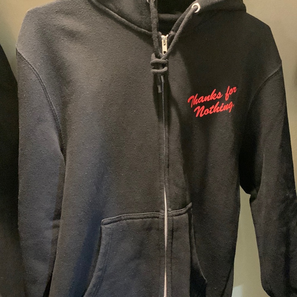 Im selling a black/red Zuni ex sweater. It says “Thanks for nothing.”